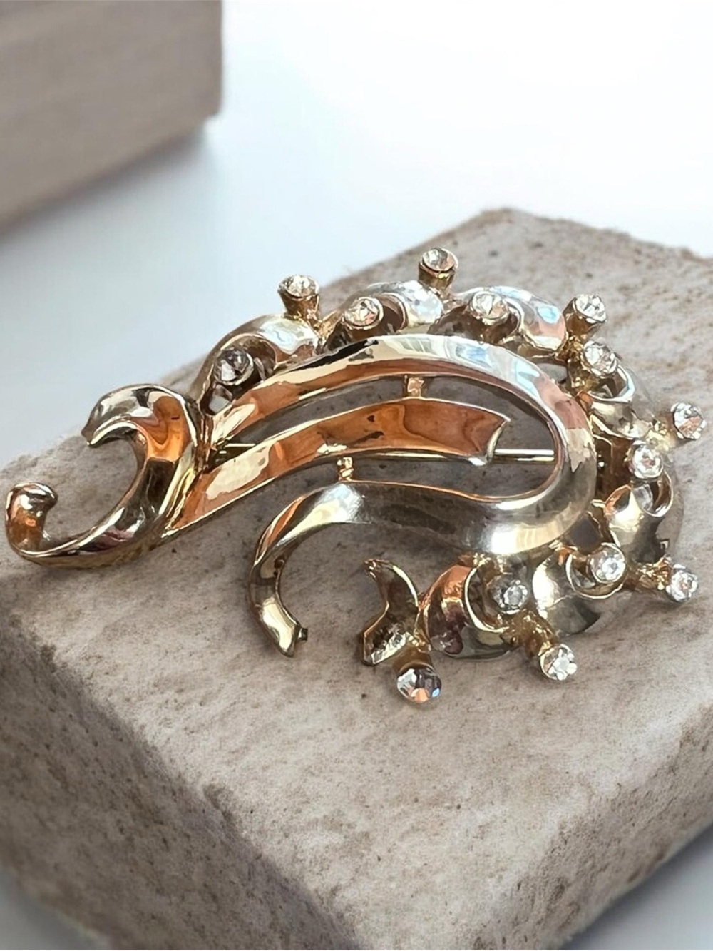 Coro Gold-Tone Swirl Brooch with Clear Rhinestones